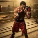 Boxeur musclé en gants rouges, posture défensive dans ring
